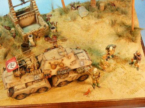 Diorama a escala 1/35 que representa a un grupo de soldados del Dak en el norte de Africa, descansando y reponiendo fuerzas en un Oasis.