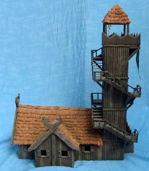 Impresionante construccion de una casa fortaleza con una atalaya muy alta adosada en Rohan. 
