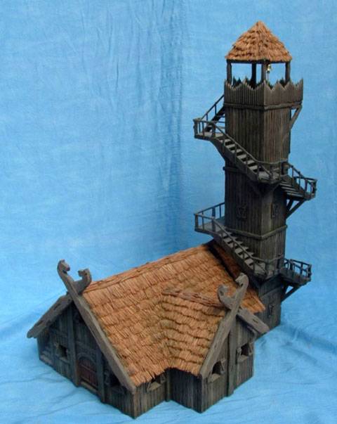Impresionante construccion de una casa fortaleza con una atalaya muy alta adosada en Rohan. 