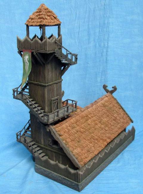 Impresionante construccion de una casa fortaleza con una atalaya muy alta adosada en Rohan. 