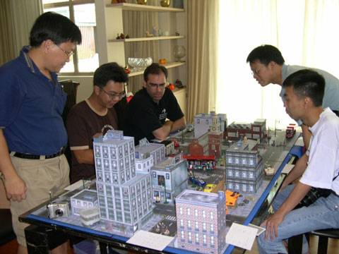 Partida de wargame Zombie Invasion jugada por el grupo Napnuts en Singapur 