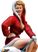 Figura de la casa de miniaturas, Andrea Miniatures a escala 80 mm, 1/16 representado a una de las chicas pin up en el modelo de Chica Santa Claus Navide&ntilde;a, sentada sobre un pedazo de hielo y llevando como mascota un pinguino. 