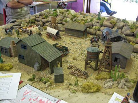 Escaramuza de wargame en un Pueblo Minero del Oeste