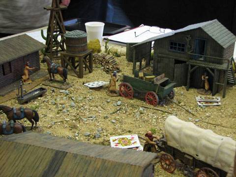 Escaramuza de wargame en un Pueblo Minero del OesteEscaramuza de wargame en un Pueblo Minero del Oeste