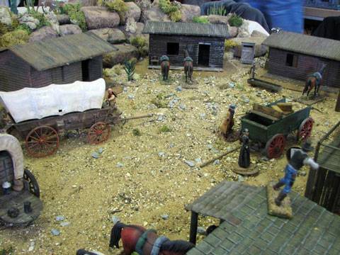 Escaramuza de wargame en un Pueblo Minero del Oeste