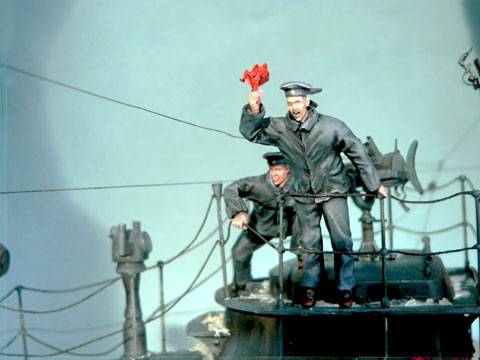 Diorama a escala 1:35 completamente a scratch representando a un submarino que ha emergido en aguas polares y en la colision con la capa de hielo se han producido desperfectos en el casco y en la torreta. 